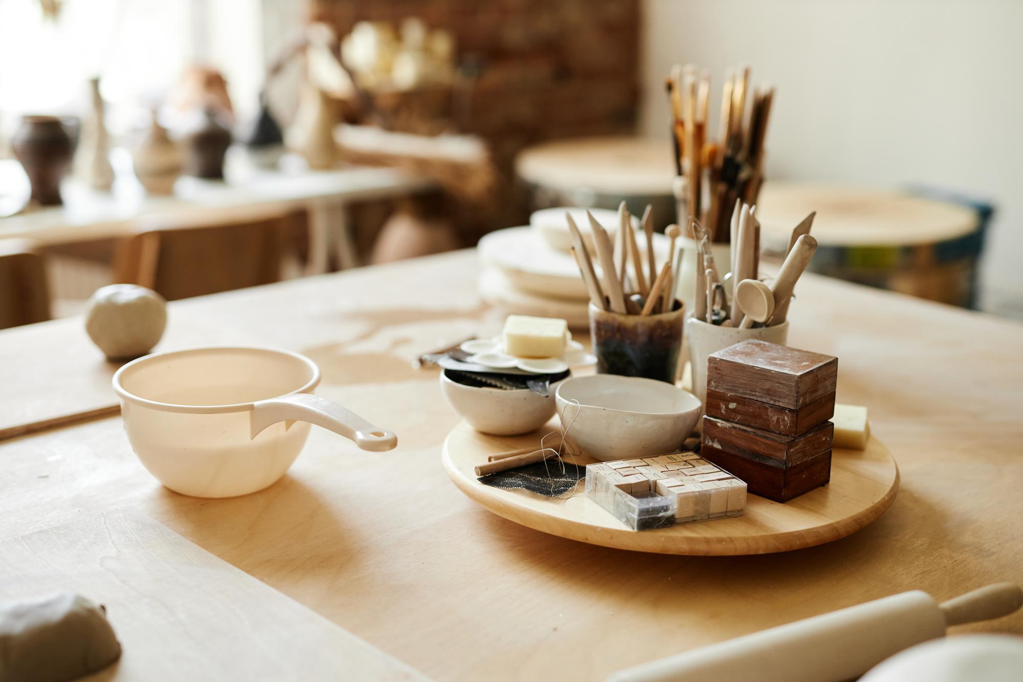 Interior of artisanal kitchen workspace with utensils
