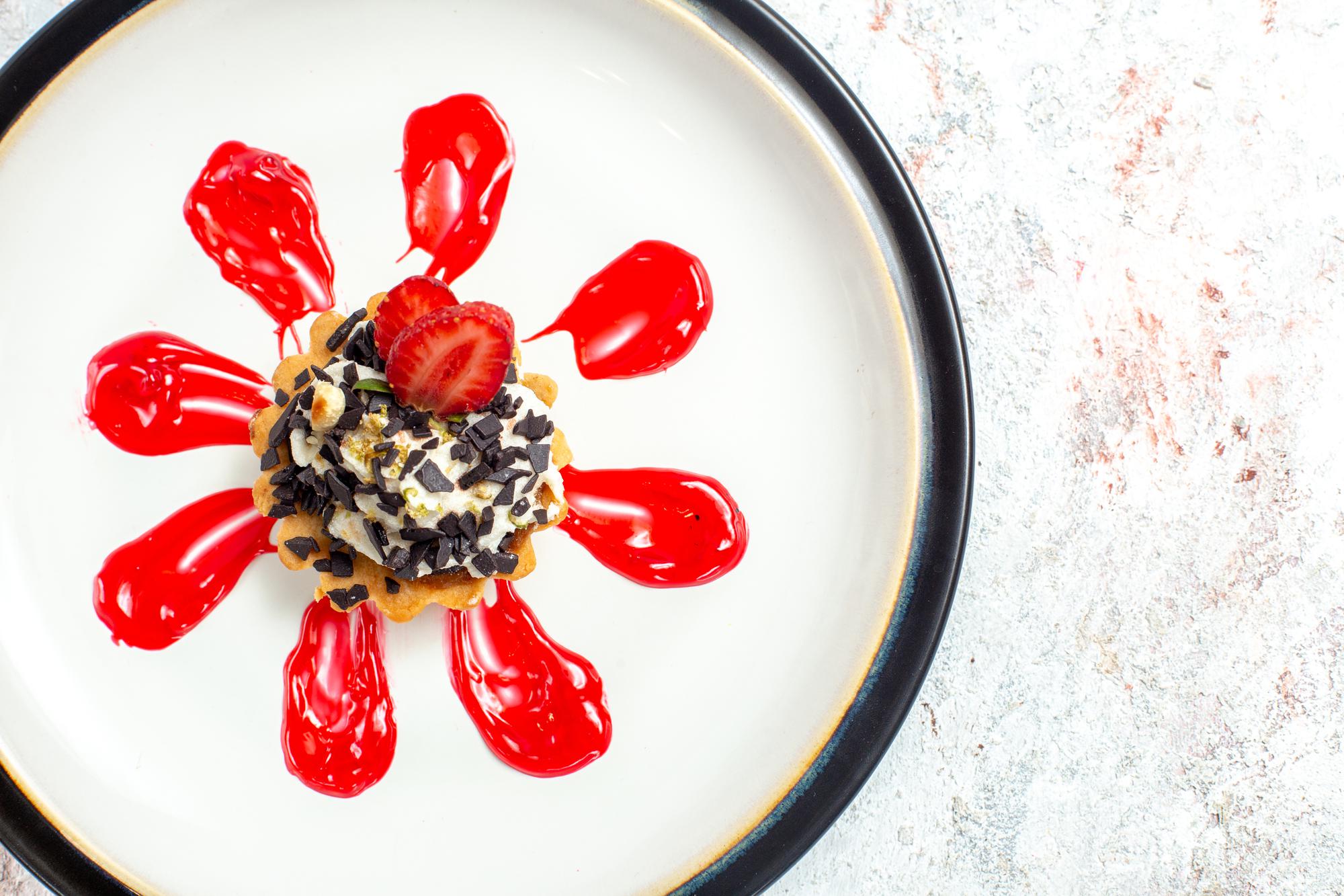 Close-up of plated dessert with sauce swirl